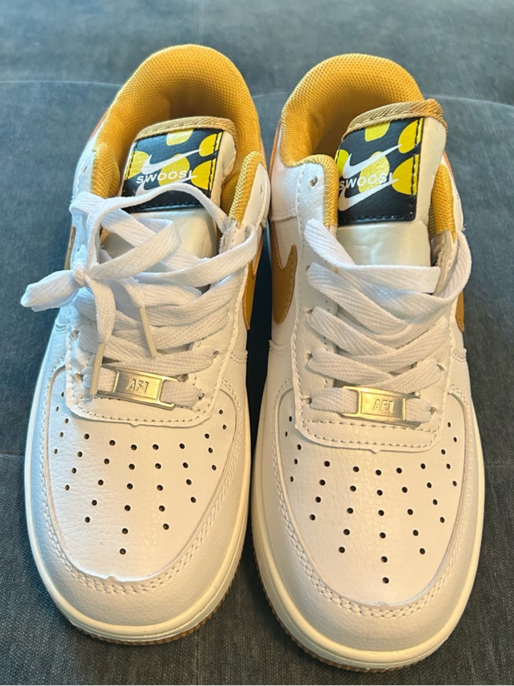 Nike Kids White Sneakers with Yellow Accents